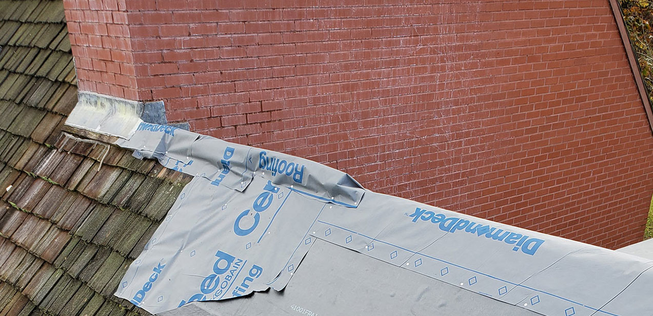 Home with Newly Installed Complex Weatherproof Roofing System