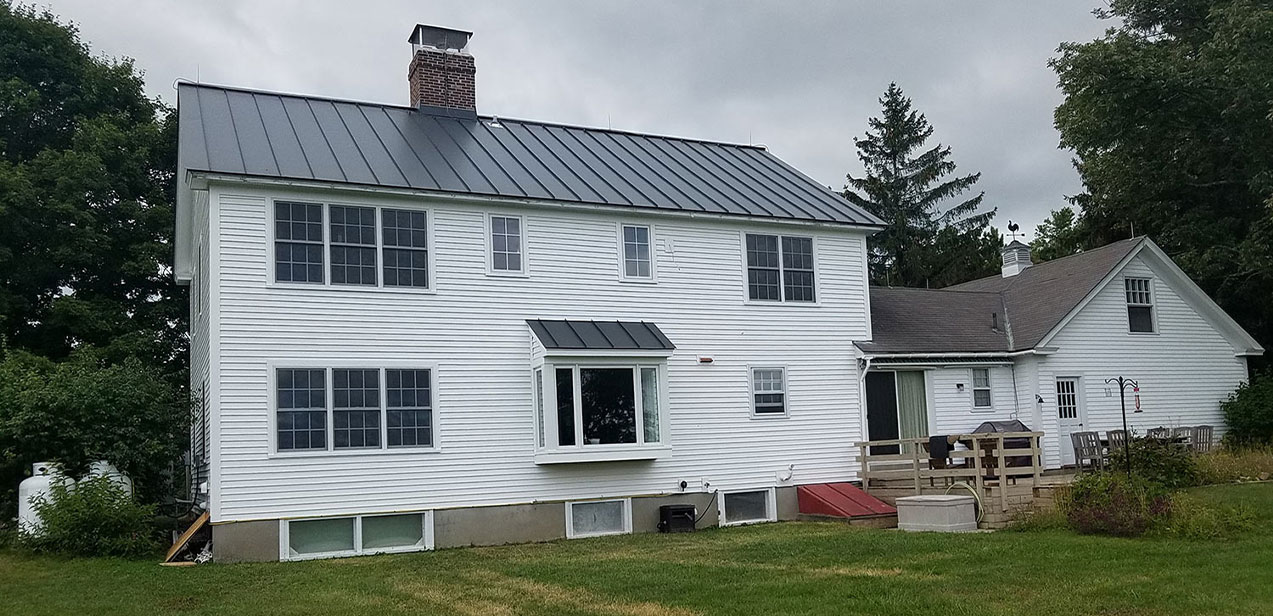 Home with Newly Installed Standing Seam Roofing