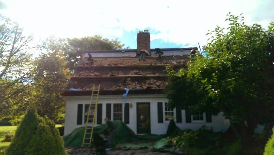 New Cedar Shake Roof - Crew Stripping old Roofing